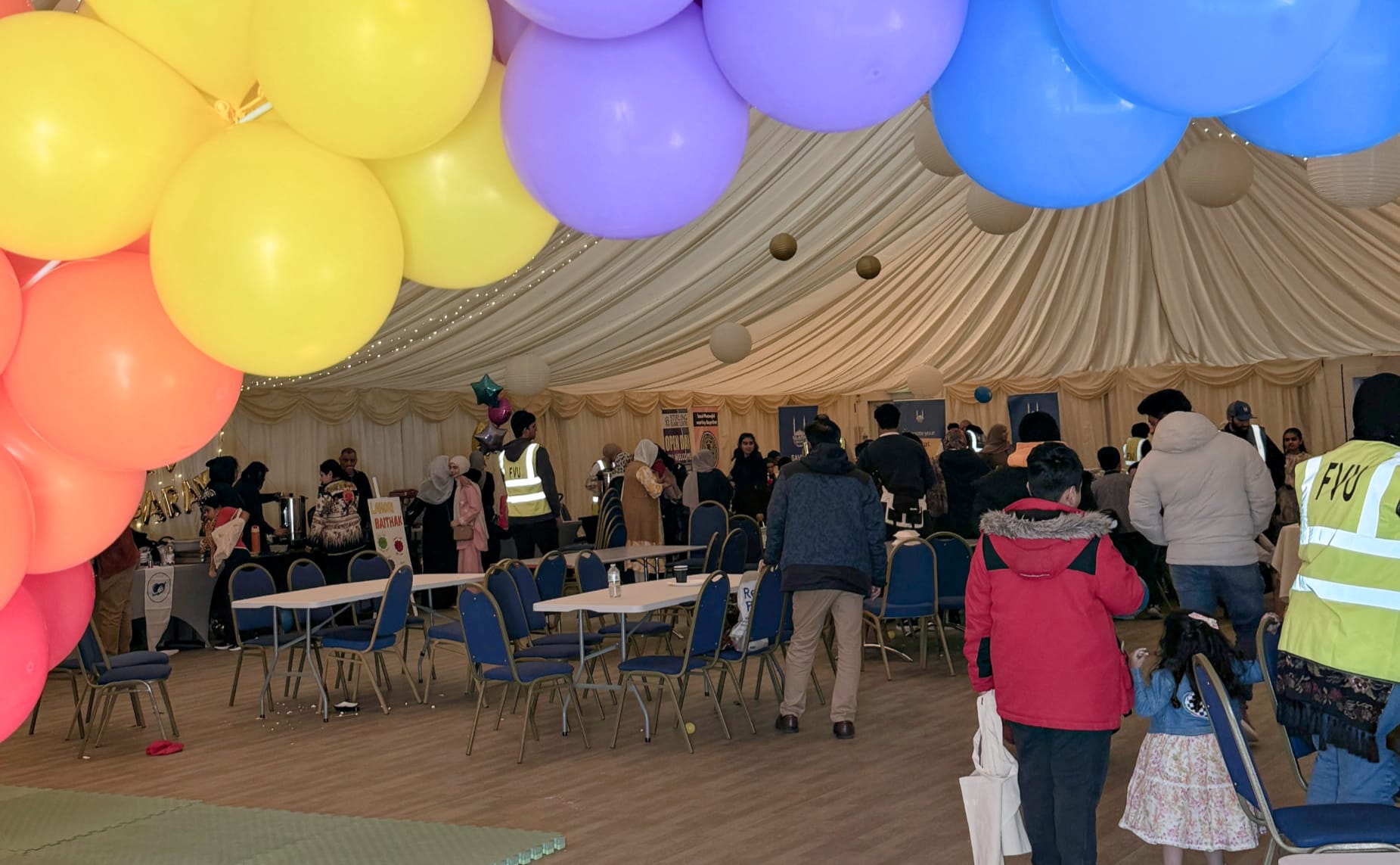 The balloon arch entrance at the side of the venue.